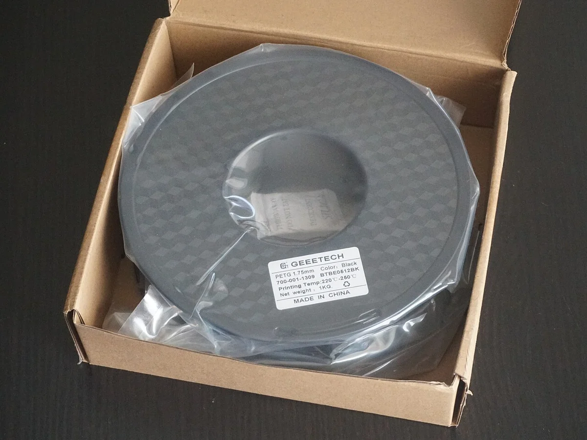 1 kg PETG filament spool sealed in packaging